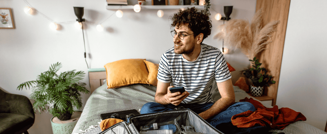 Traveller researching their trip using our Cover-More app before flying out