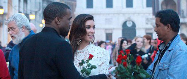 Jetsetters Kim Kardashian and Kanye West meet with a street vendor. This is the ultimate celebrity spotting photo opp.