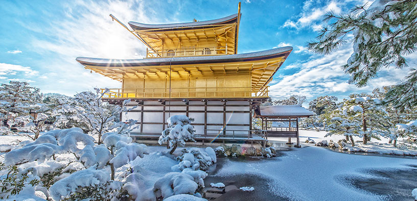snowy golden temple in japan