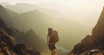 Hiker standing at outlook