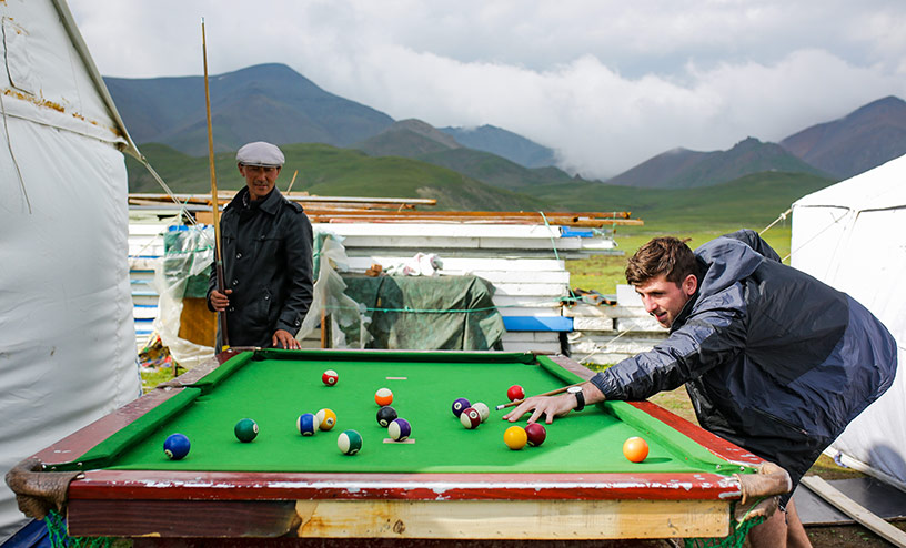playing a game of pool in tibet
